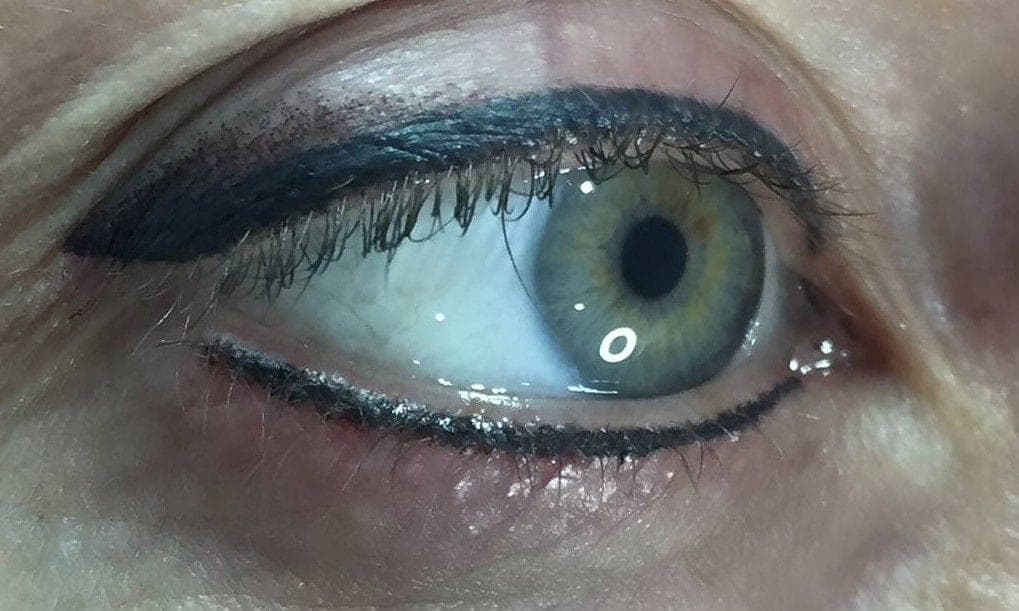 Fine eyeliner along the upper and lower lash lines